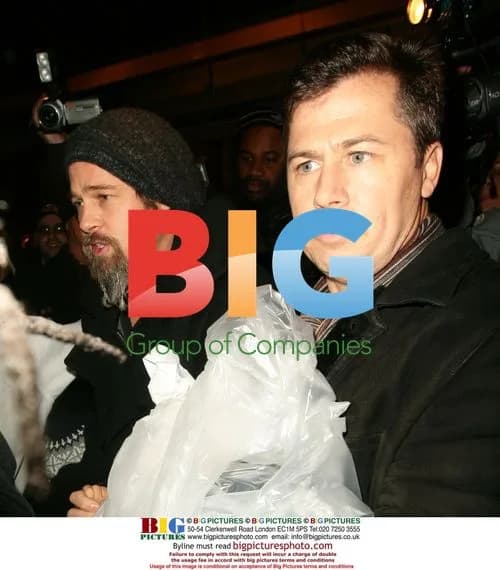 Brad Pitt with sons at arcade