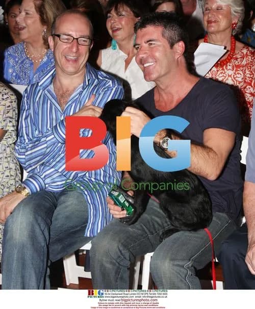 Simon Cowell with Dog at Caribbean Auction