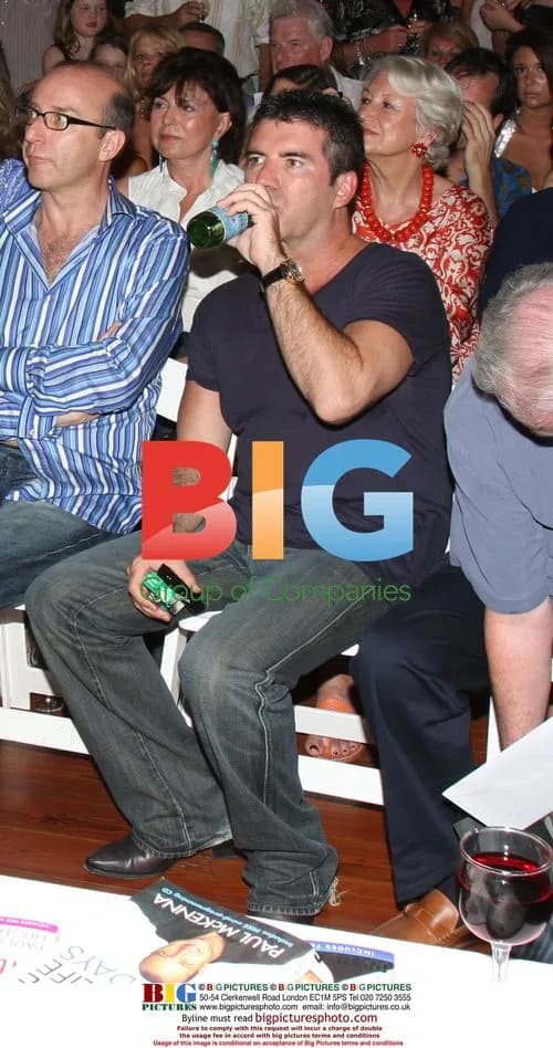 Simon Cowell and pet at Caribbean auction