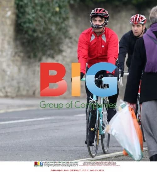 Robbie Williams Test Rides New Bike