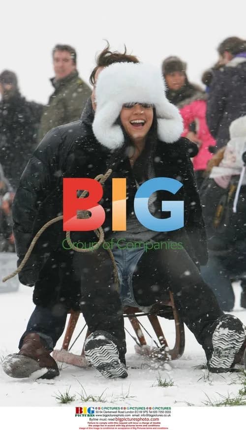 Lily Allen sledding in London