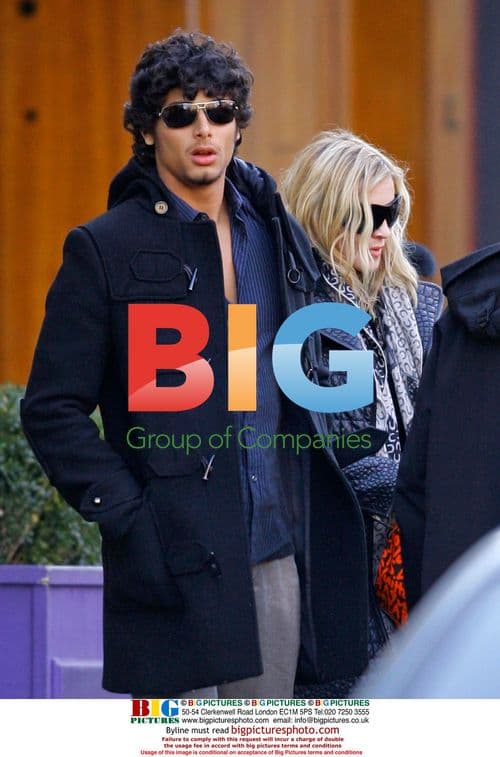 Madonna leaves Nero Restaurant with family