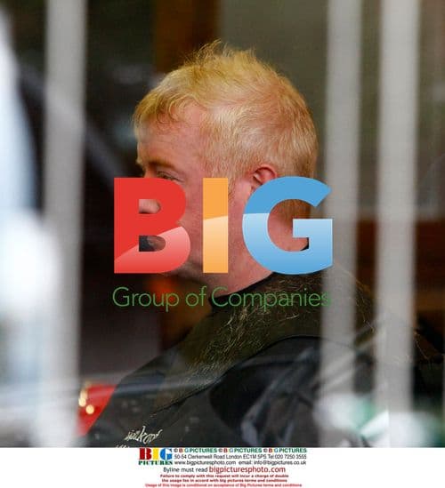 Chris Evans gets haircut in London