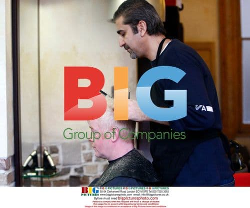 Chris Evans gets haircut in London