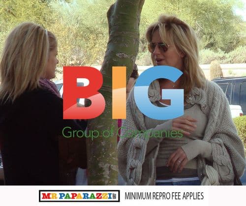 Rod Stewart with ex-wife and partner at son's hockey game