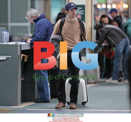 Adam Brody arrives at Vancouver airport