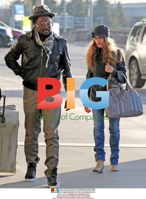 WILL.i.am arrives at YVR with Mystery Girlfriend