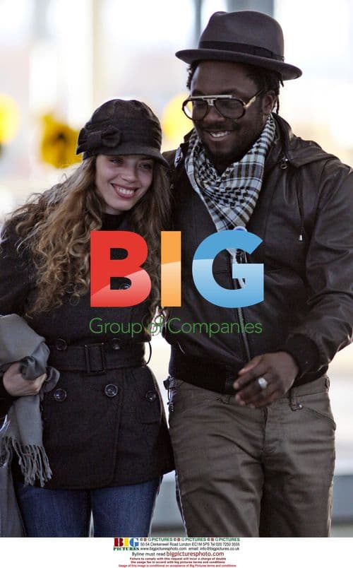 WILL.i.am Arrives at YVR with Mystery Girlfriend