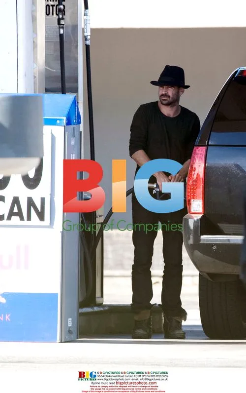 Colin Farrell pumps gas in LA