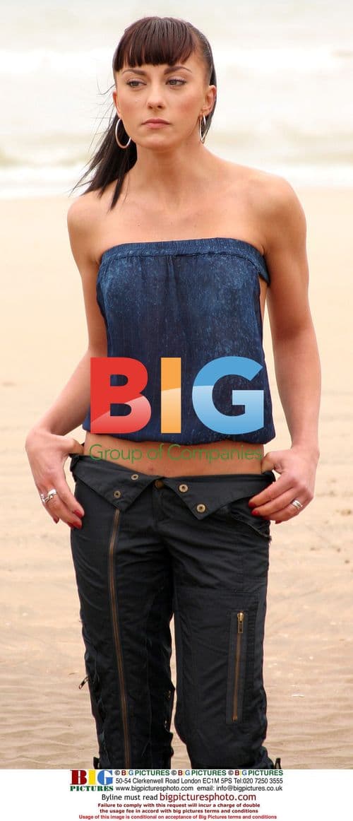 Gabriela Irimia of The Cheeky Girls on beach after split