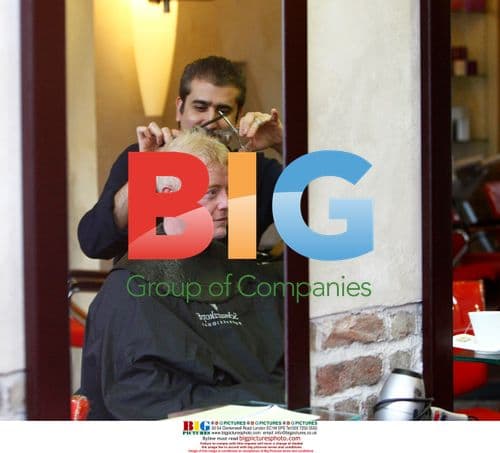 Chris Evans Gets Haircut at Barber Shop