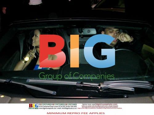 Rihanna and Chris Brown leaving Clive Davis party