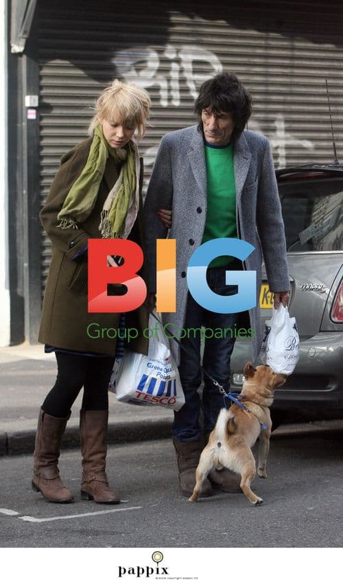 Ronnie Wood and Ekaterina Ivanova walk dog in London