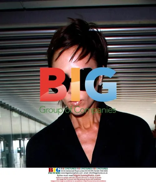 Victoria Beckham departs Heathrow for Milan