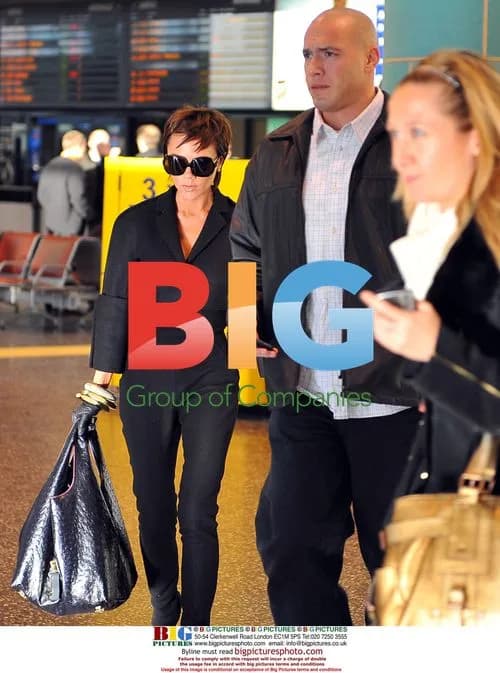 Victoria Beckham arrives at Milan airport