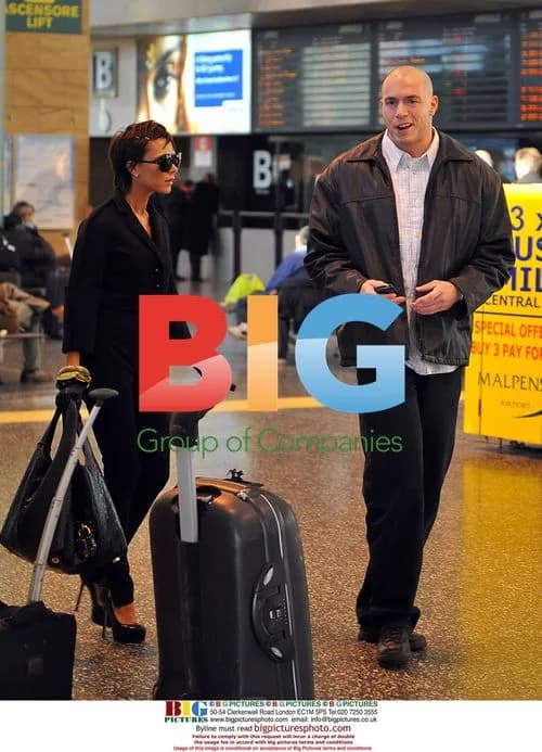 Victoria Beckham Arrives at Milan Airport