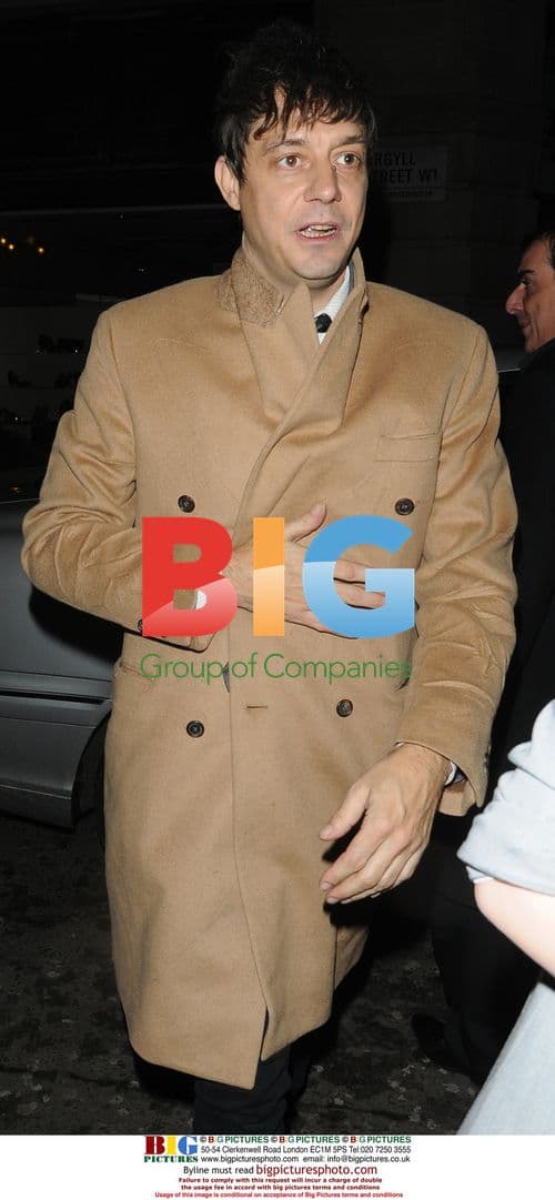 Jamie Hince arrives home after night out with Kate Moss