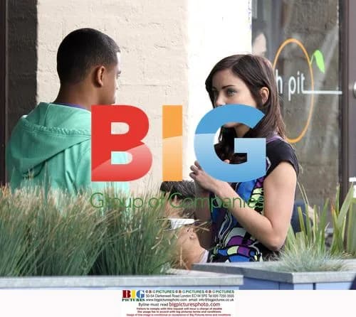 Tristan Wilds and Jessica Stroup on 90210 set
