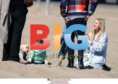 Naomi Watts with son Alexander on beach
