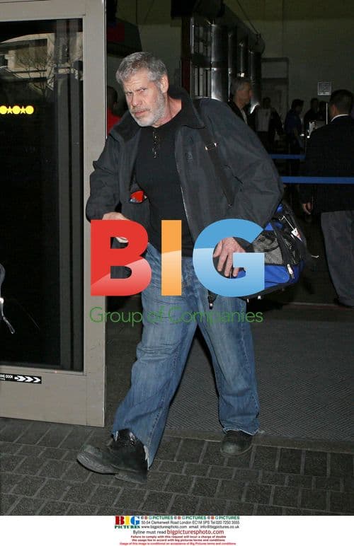 Ron Perlman with dog at LAX