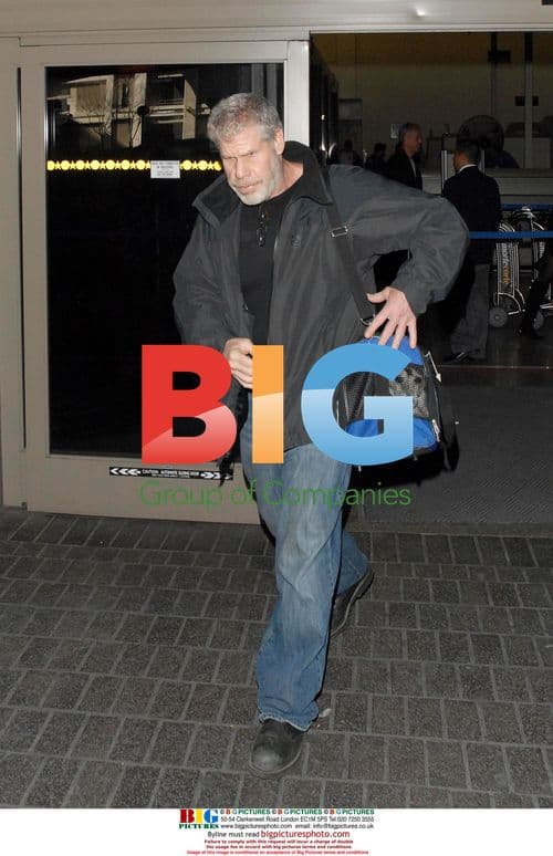 Ron Perlman with his dog at LAX