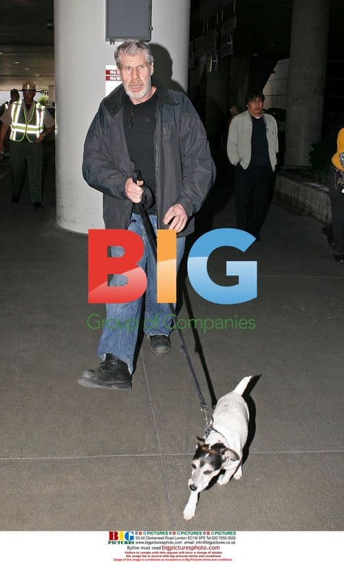 Ron Perlman with dog at LAX