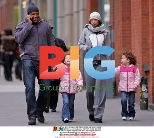 Michael Strahan strolls with daughters in Soho