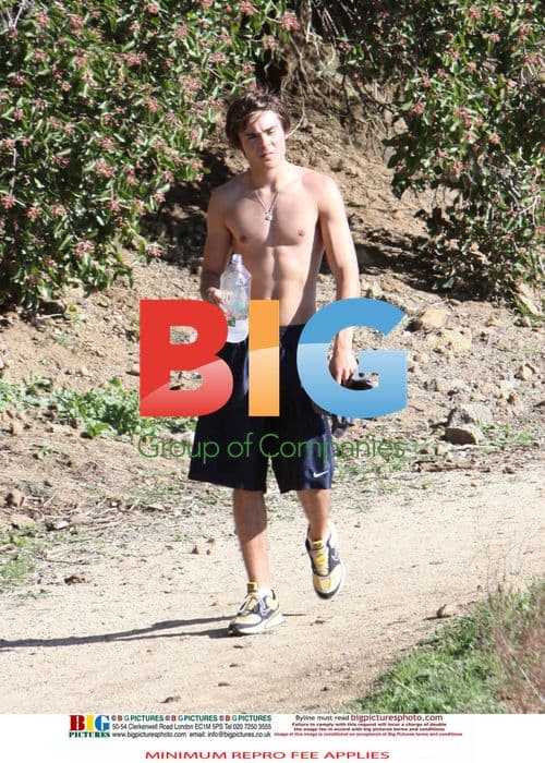 Zac Efron Hydrates After Hike