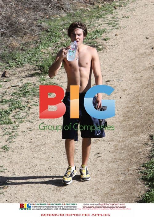 Zac Efron Replenishes After Hike