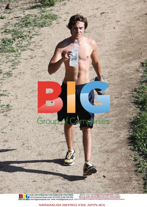 Zac Efron Replenishes After Hike