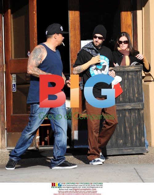 Travis Barker and Friend Leaving Cafe