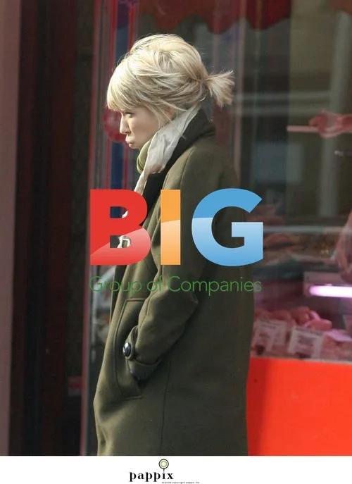Ronnie Wood and Ekaterina Ivanova walk dog in London