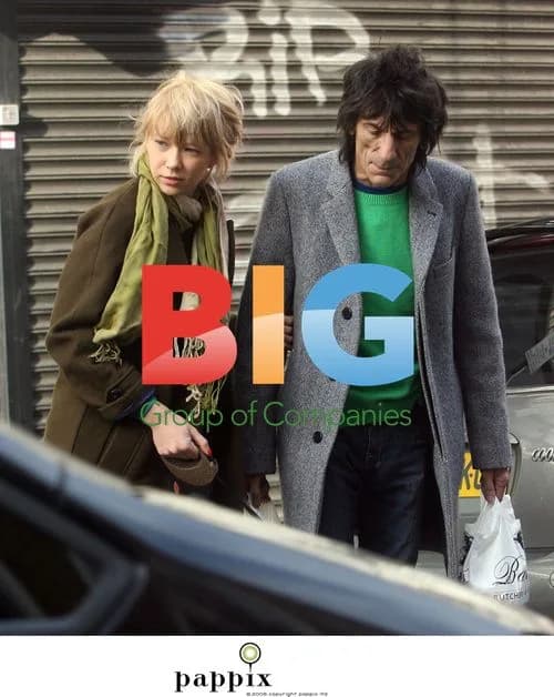 Ronnie Wood and Ekaterina Ivanova walk dog in London
