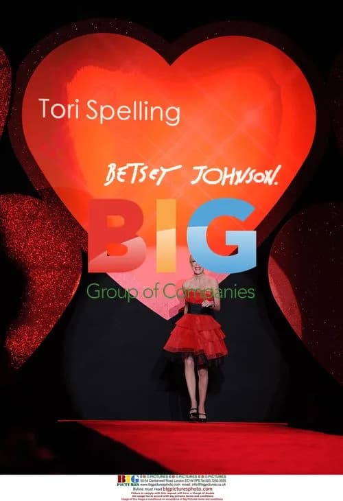 Tori Spelling Walks Red Dress Runway