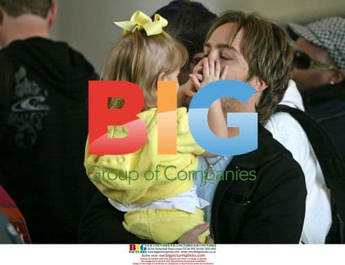 Larry Birkhead and Dannielynn at LAX
