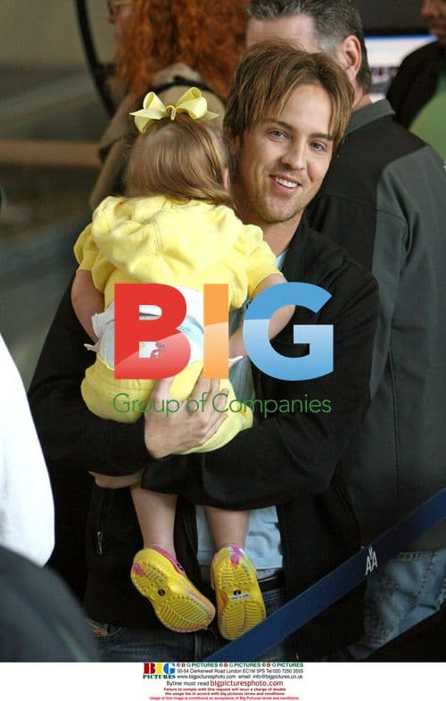 Larry Birkhead and daughter Dannielynn at LAX