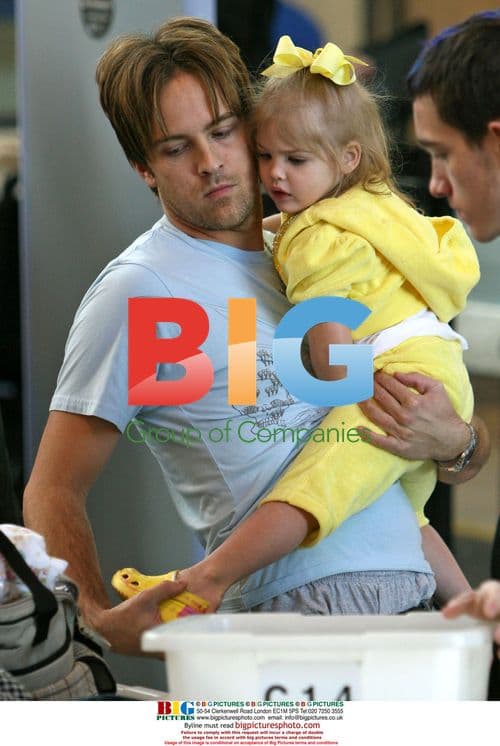 Larry Birkhead with daughter Dannielynn at LAX