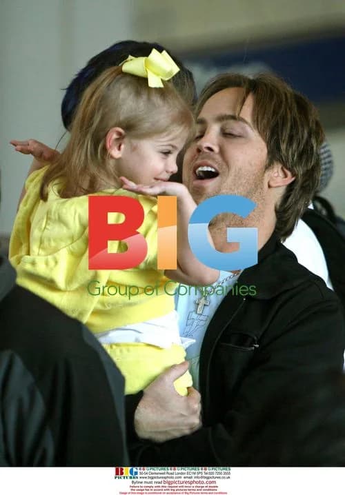 Larry Birkhead with Daughter Dannielynn at LAX