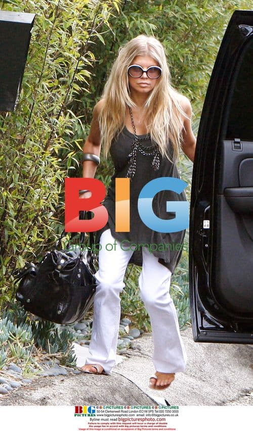 Fergie and Josh Duhamel Depart LAX