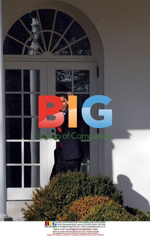 Obama Walks to Oval Office