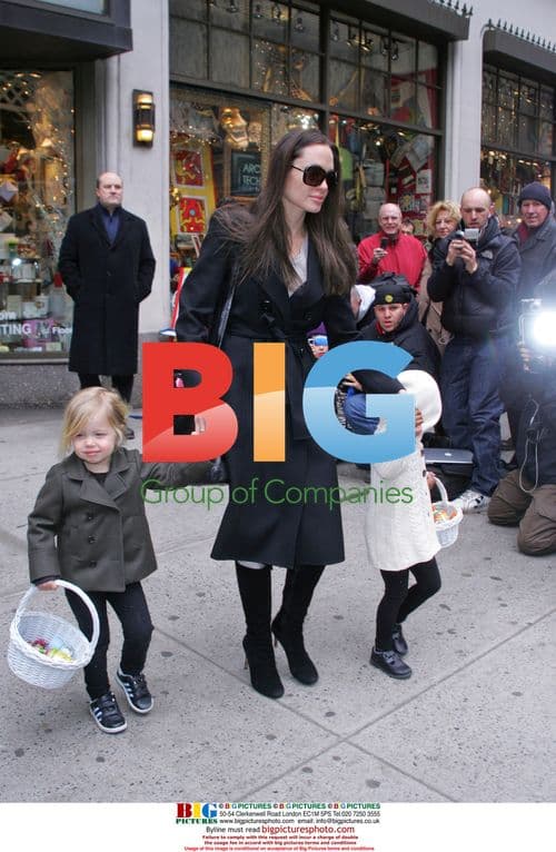 Angelina Jolie shops with daughters