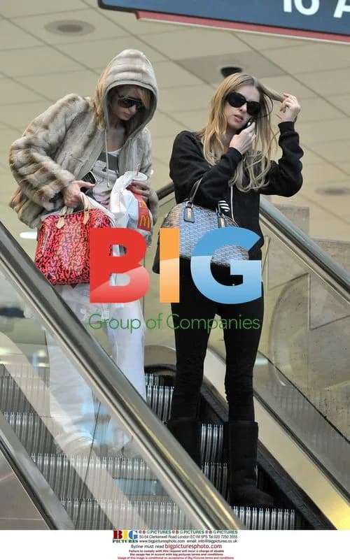Paris and Nicky Hilton arrive at LAX