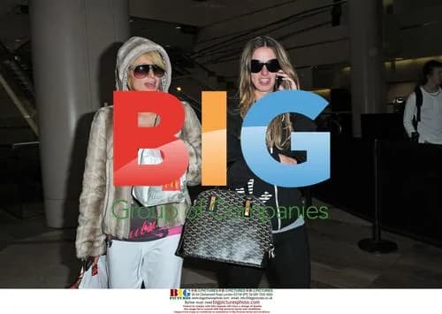 Hilton sisters arrive at LAX