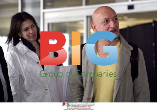 Sir Ben Kingsley and wife arrive at LAX