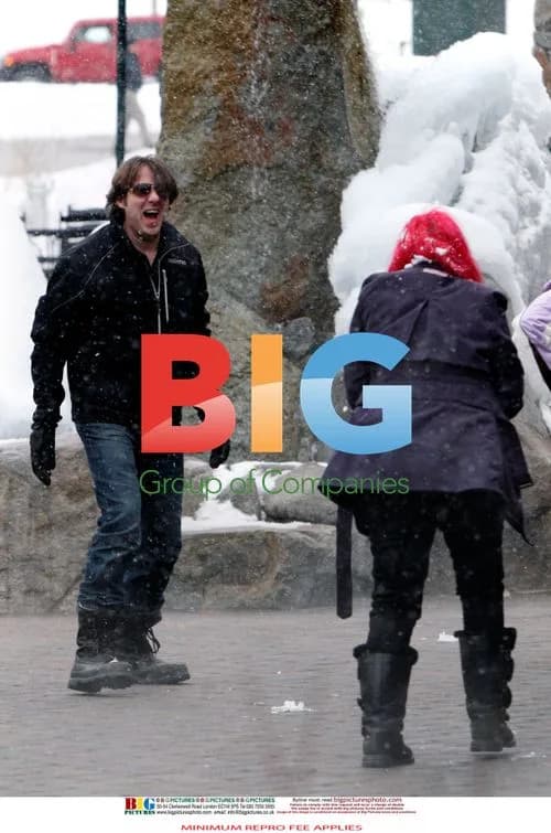 Jonathan Ross and Family Fooling Around in the Snow