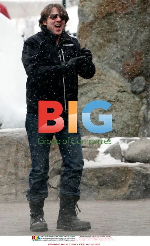 Jonathan Ross and family play in the snow