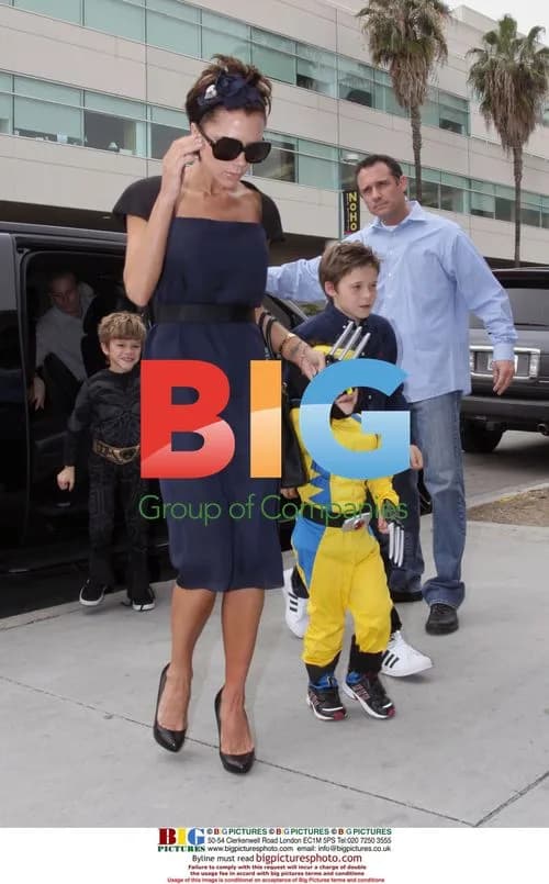 Victoria Beckham with kids at son's party