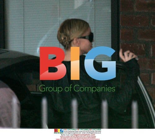 Madonna visits Ed Hardy Designer