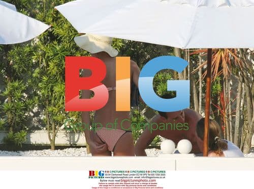 Gisele Bundchen relaxes on hotel terrace in Rio