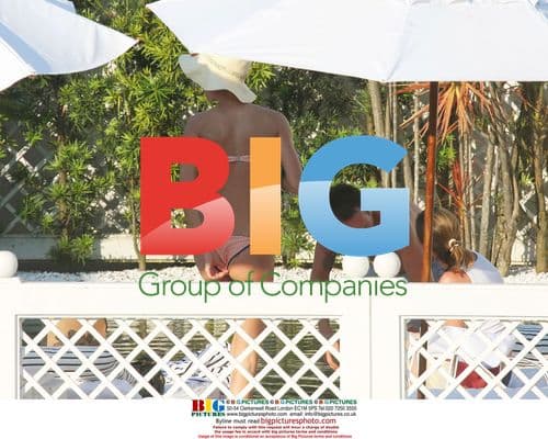 Gisele Bundchen Relaxes on Hotel Terrace